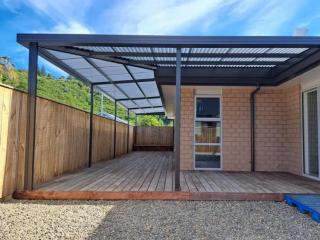 Sleek mono-pitch awning enhancing the exterior of a home