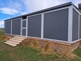 Outdoor blinds protecting a seating area