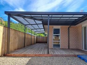 Sleek mono-pitch awning enhancing the exterior of a home